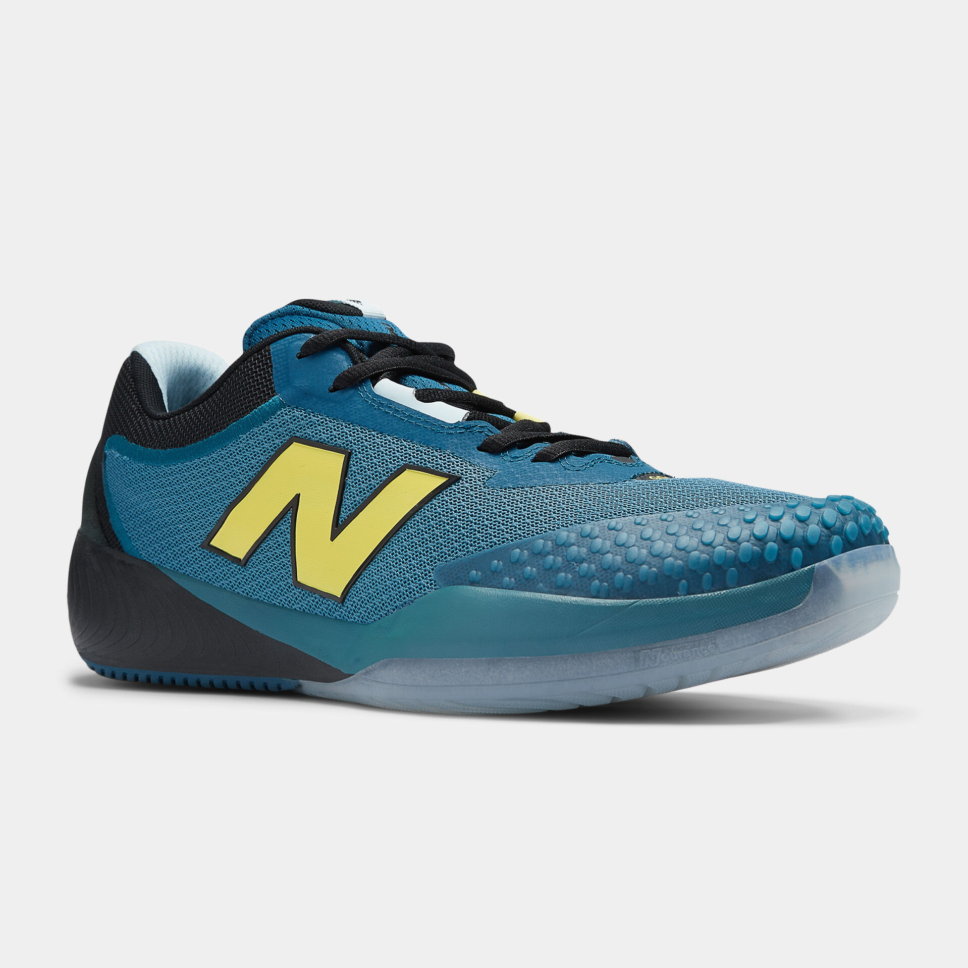 Navy and black shoe sitting on a white background.