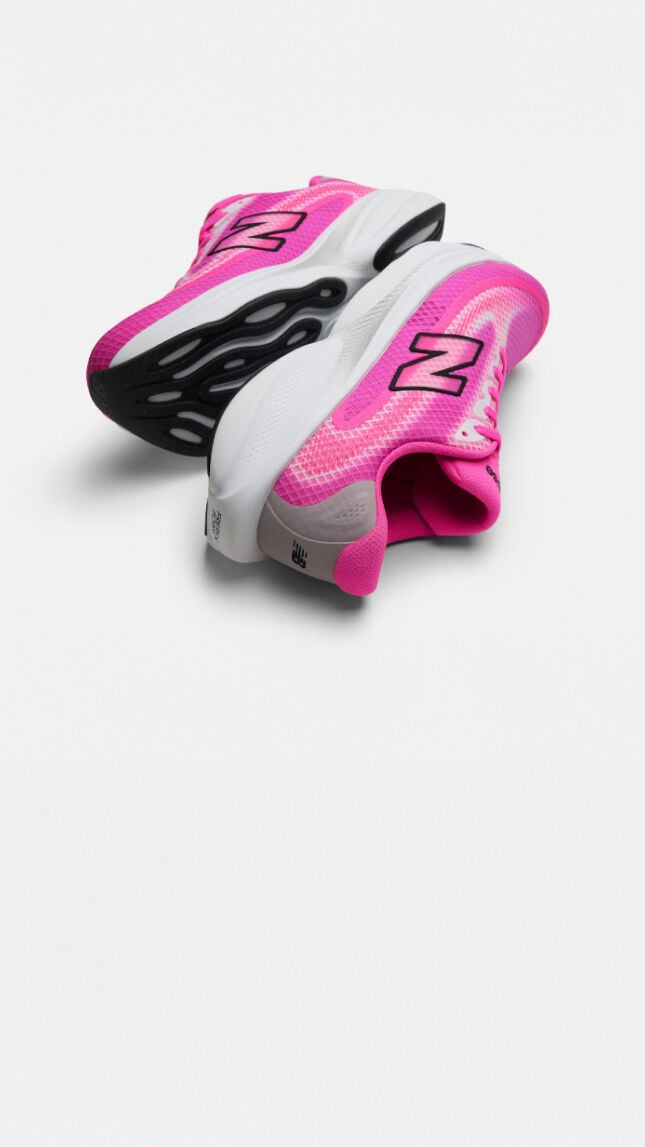 Single pink running shoe on a white background 